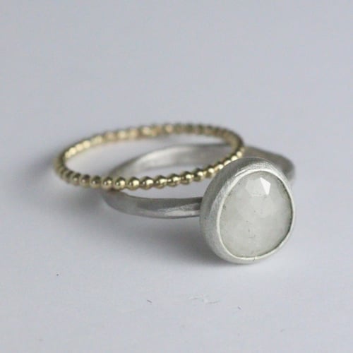 Image of Small pale grey sapphire ring.