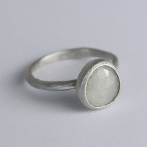 Image of Small pale grey sapphire ring. 