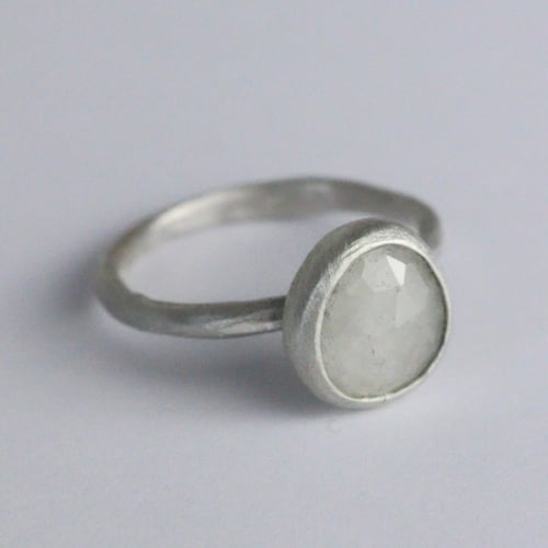 Image of Small pale grey sapphire ring.