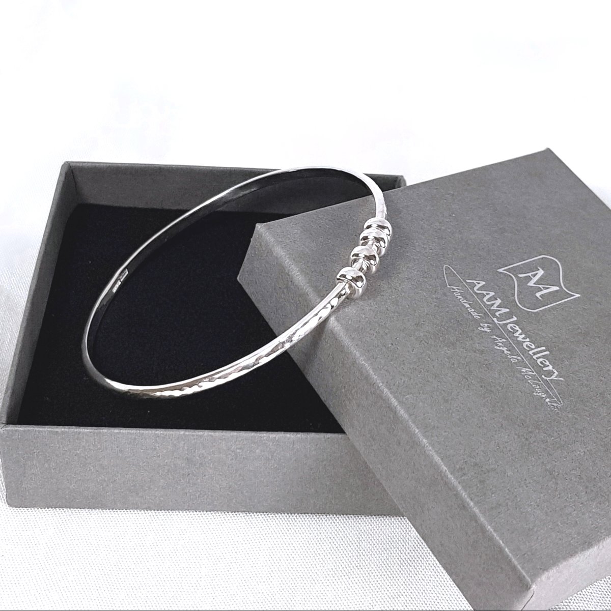 Image of Sterling Silver Four Ring Bangle Bracelet, 40th Birthday Gift, Fidget Bracelet, Handmade UK