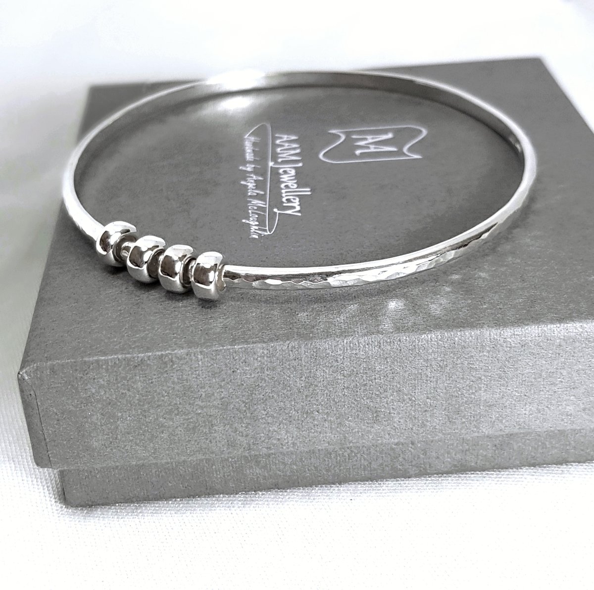 Image of Sterling Silver Four Ring Bangle Bracelet, 40th Birthday Gift, Fidget Bracelet, Handmade UK