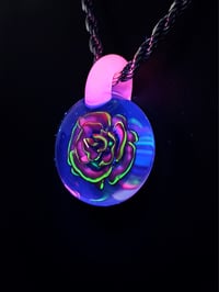 Image 1 of Uv reactive rose pendant with glow stick bale.