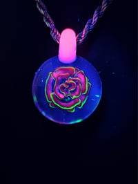 Image 3 of Uv reactive rose pendant with glow stick bale.