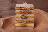 Image 1 of Baby headbands set mustard