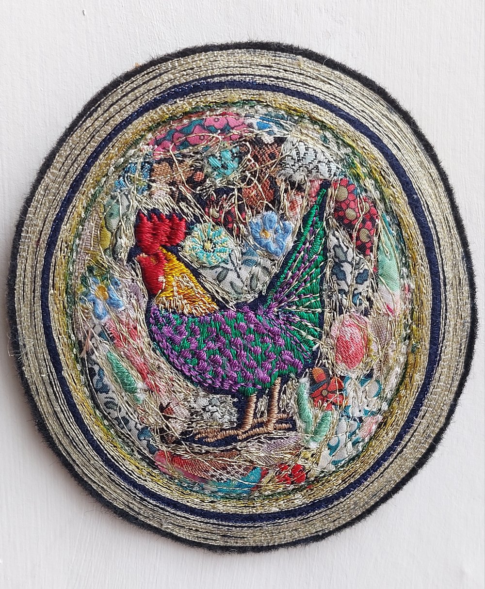Image of Cockerell miniature embroidery hanging 
