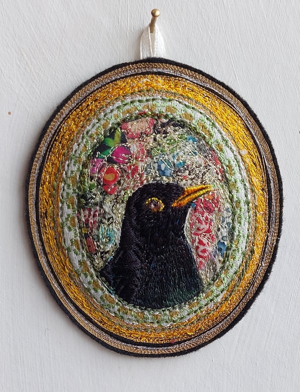 Image of Blackbird portrait miniature embroidery hanging 