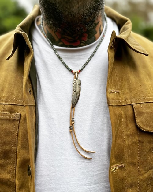Image of Glass bead necklace with German silver feather