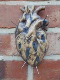 Image 1 of The Cursed Heart ceramic wall decor