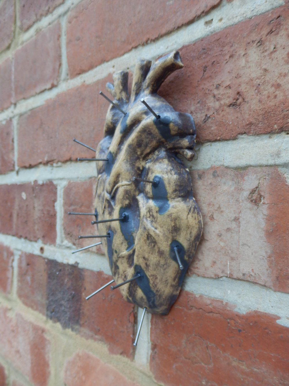 The Cursed Heart ceramic wall decor