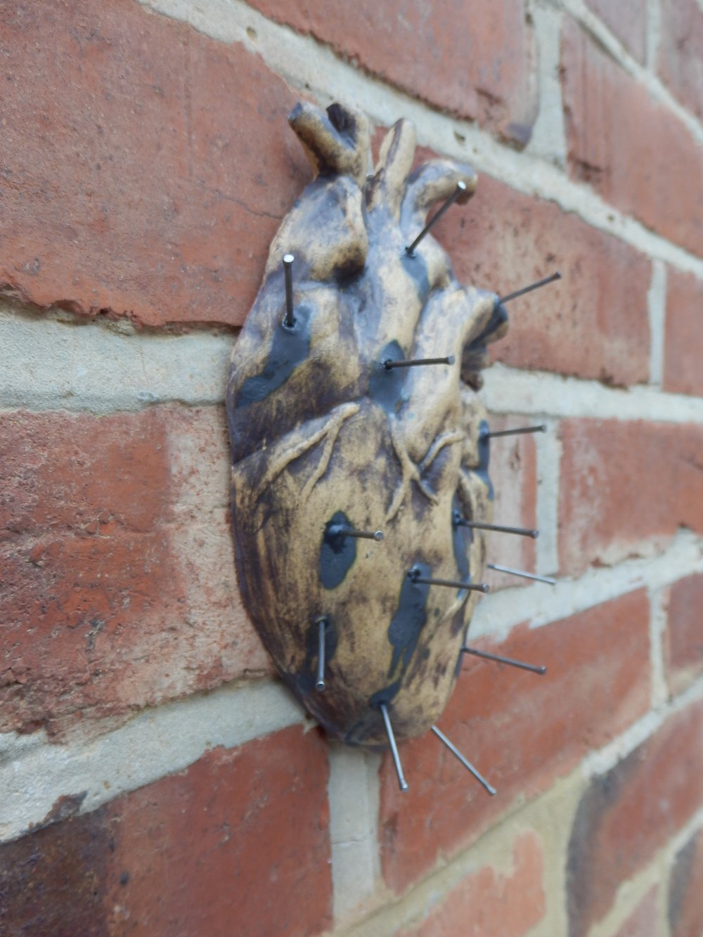 The Cursed Heart ceramic wall decor