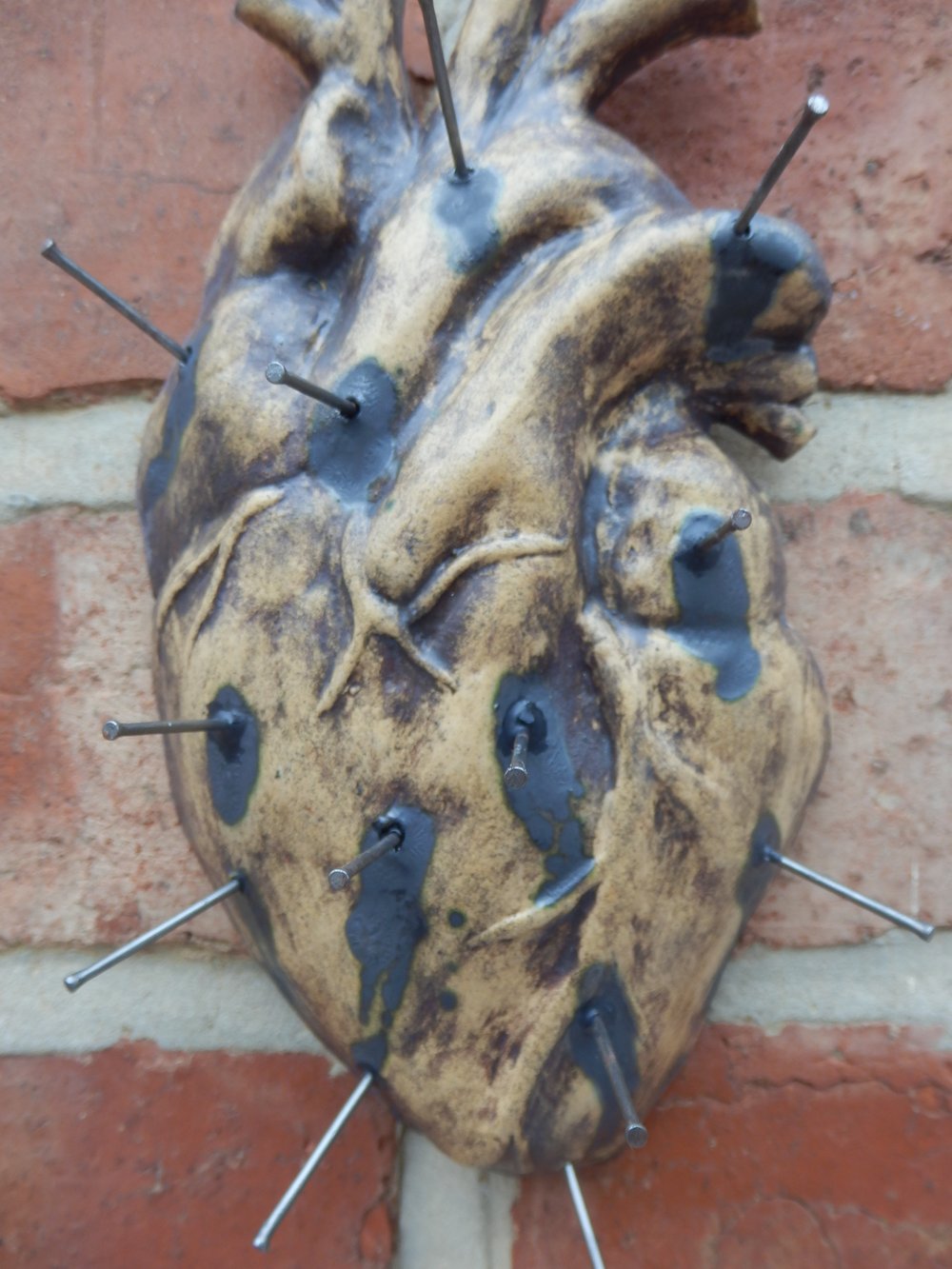 The Cursed Heart ceramic wall decor