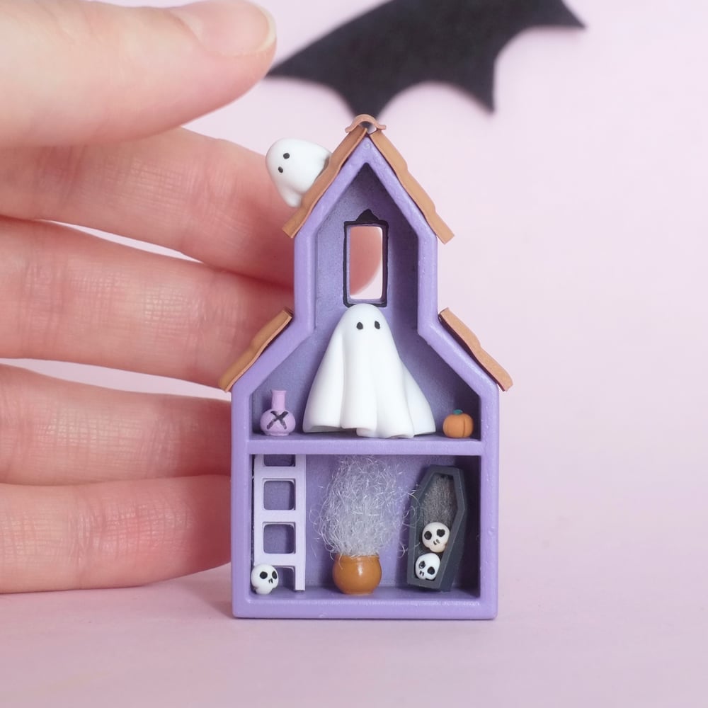 Anniversary spooky purple house