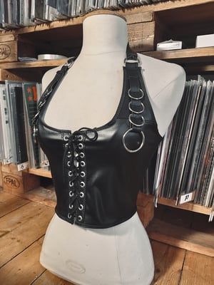 Image of Fauxleather top with rings