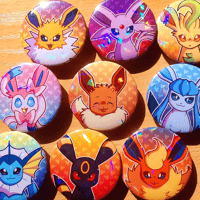 Image 1 of Eeveelutions 1.75 Inch Holographic Pin Buttons