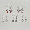 dangling 'lovergirl' heart earrings