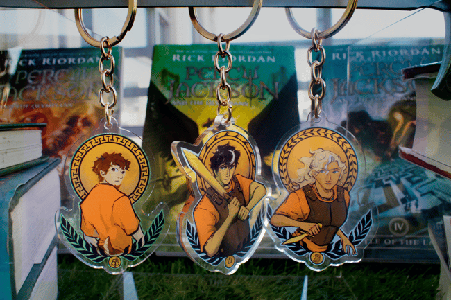 Percy Jackson and the Olympians Golden Trio Book/TV Keychain (PREORDER)