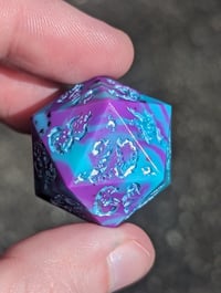 Image 1 of Turquoise and Plum Swirl Fairy Fire 22mm D20 Single