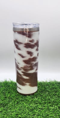 Cow print with brown pinstripe 