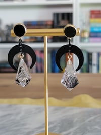 Image 3 of Fun Scary d4 dice earrings