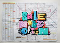 Smile more often by skyhigh. Original graffiti art on large rail map.2024