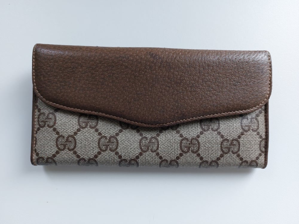 Image of Gucci brown GG monogram wallet 