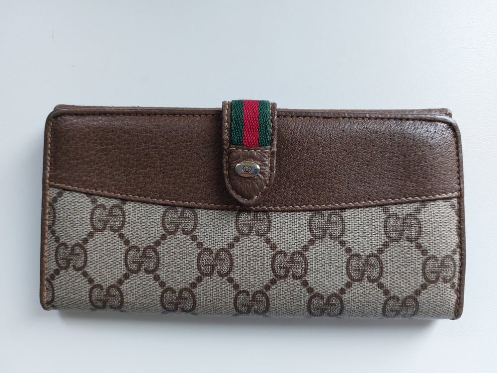 Image of Gucci brown GG monogram wallet 