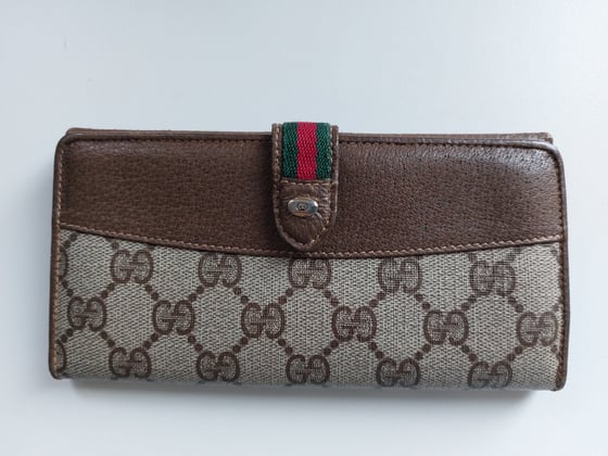 Image of Gucci brown GG monogram wallet 