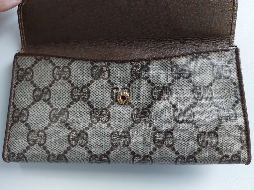 Image of Gucci brown GG monogram wallet 