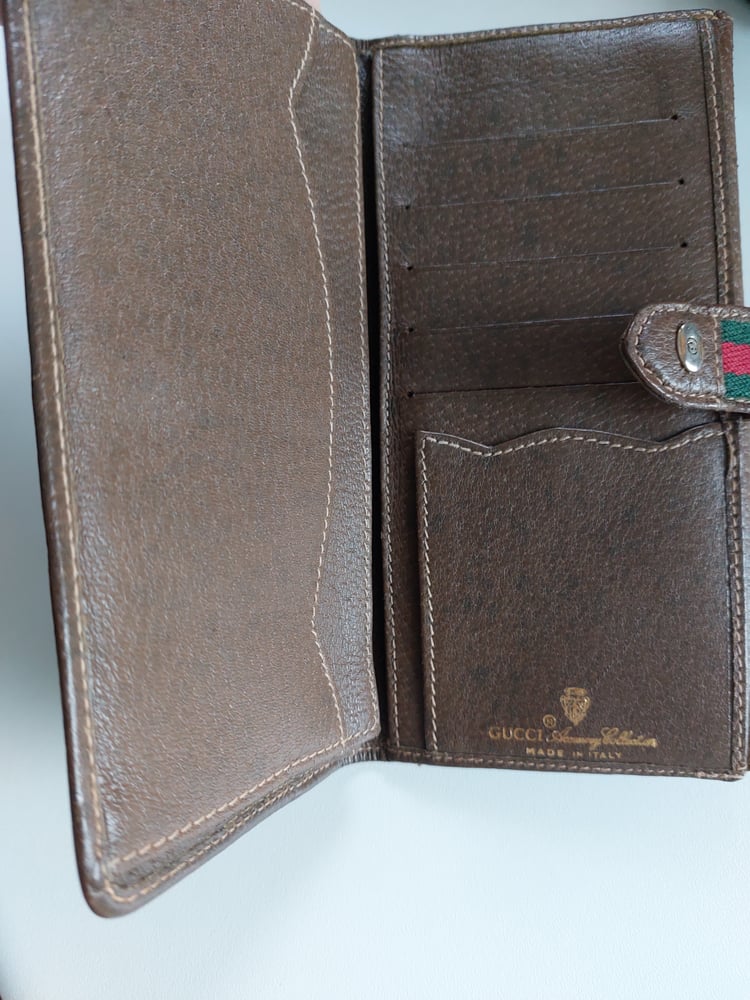 Image of Gucci brown GG monogram wallet 