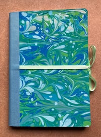 Image 1 of Green, Blue, White & Gold Hand-Marbled Thick Lined Notebook- Imbolc/Snowdrop Pattern