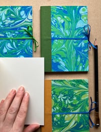 Image 2 of Small Blue, Green, White & Gold Hand-Marbled Plain Notebook- Pale Blue Binding