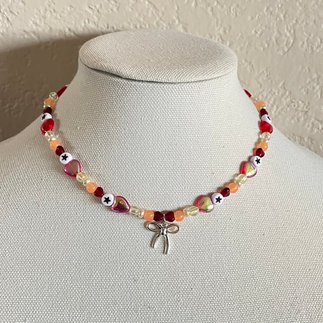 kiki's bow heart necklace
