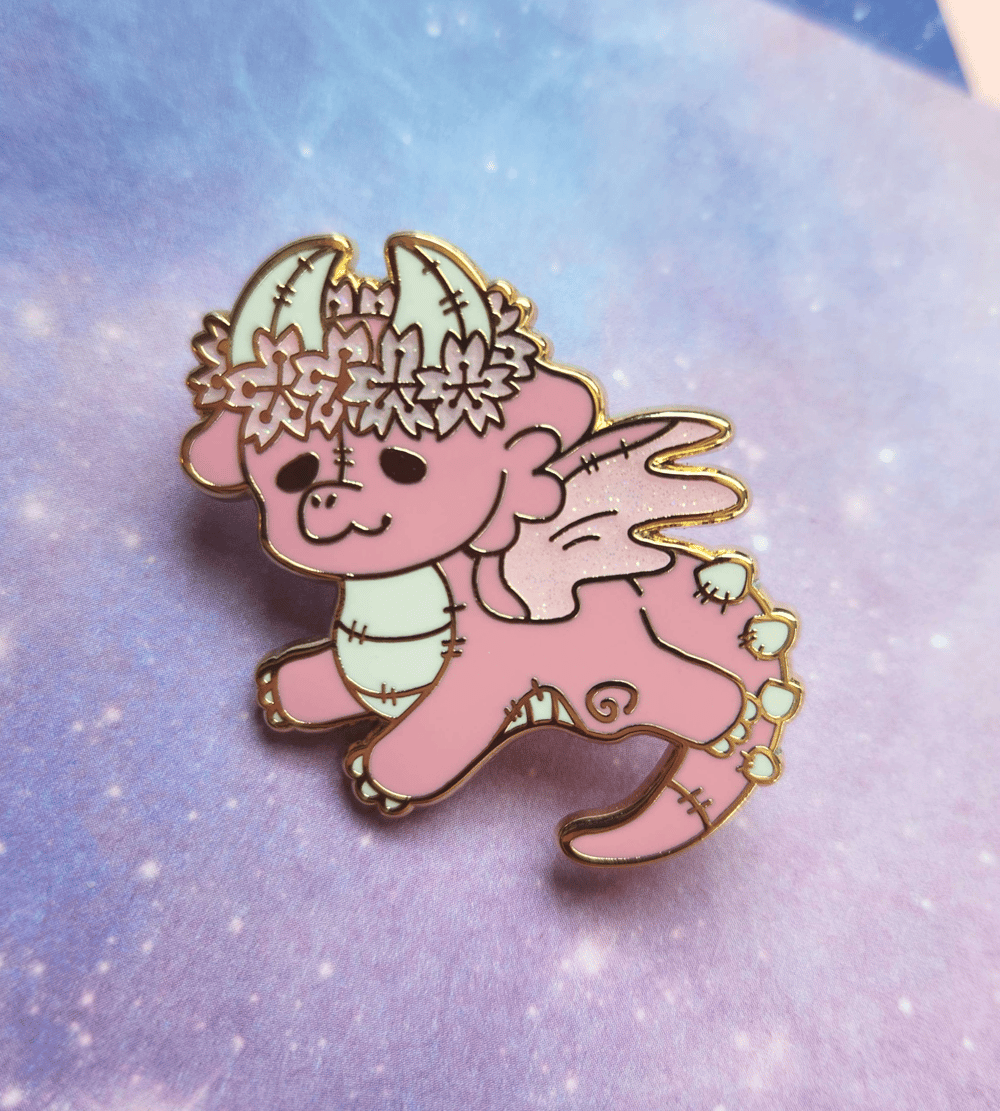 Image of Sakura plush dragon pin