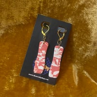 white & orange long marbled dangles