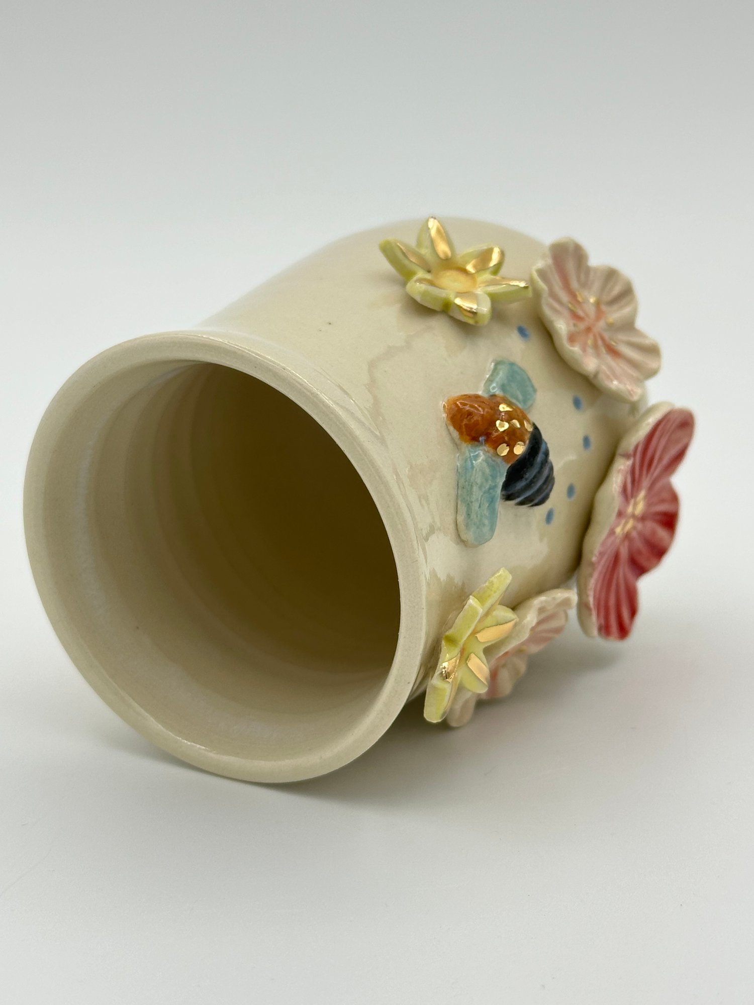 Image of Blue Banded Bee Vase (small) bee flying right