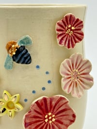 Image 1 of Blue Banded Bee Vase (medium) bee flying left