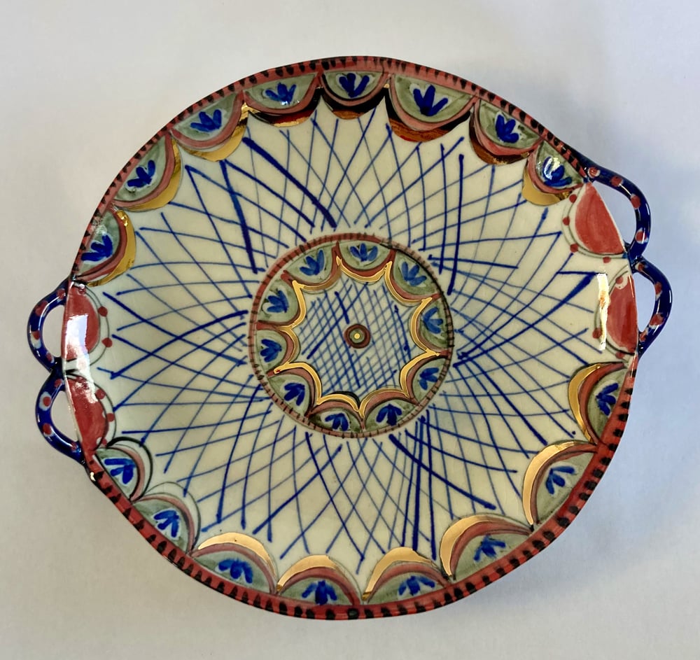 Image of Dishes with loop handles pink or blue design with gold.