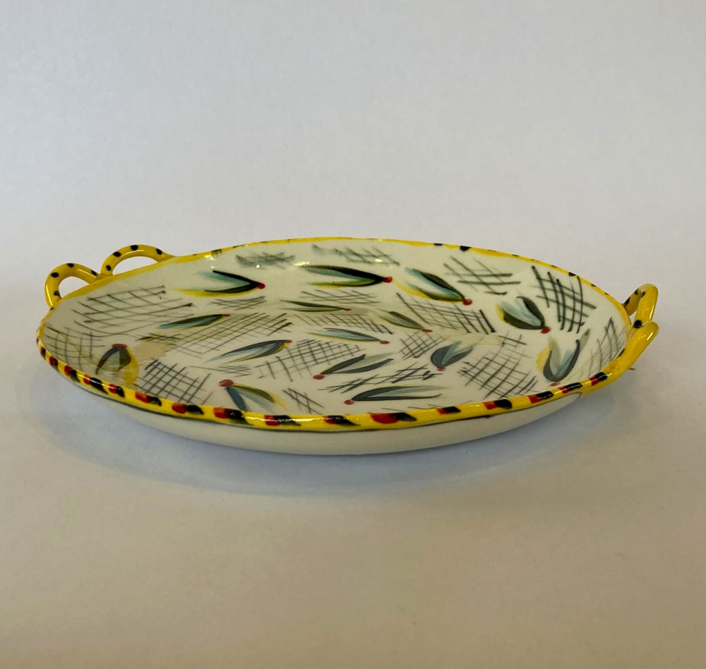 Image of Yellow dish and small bowl