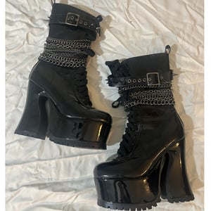 Image of HURTS LIKE HELL photoshoot chain patent platforms