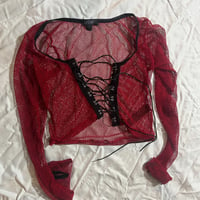Image 3 of SKELETONS music video red fishnet top