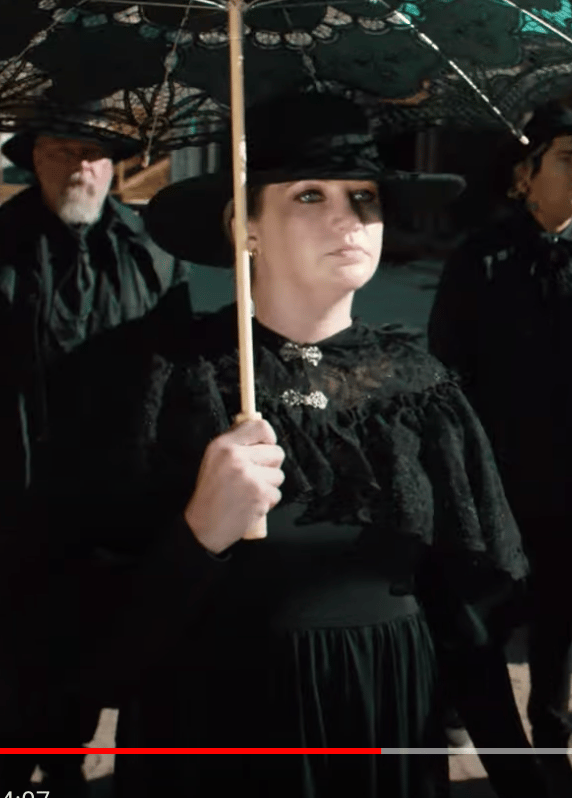 Image of HAXANS church of sanctus black dress from all the roses video