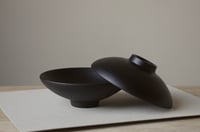 Image 1 of Ebonised oak footed bowls set