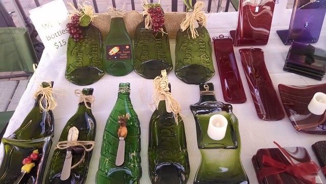 Image of Slumped wine bottles