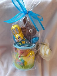 Hoppy Easter bunny on festive bucket