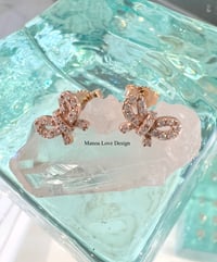 14k rose gold diamond bow stud earrings 