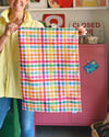 'What Can I Bring' gingham tea towel