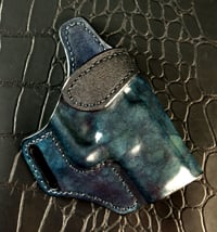 Image 1 of Glock G 19 Gen 5 Blue and Black Camo with ruff out Black avenger style holster.