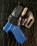 Glock 43x Blacked out pancake holster with hand tooling.