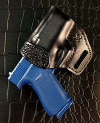 Image 2 of Glock 43x Blacked out pancake holster with hand tooling.