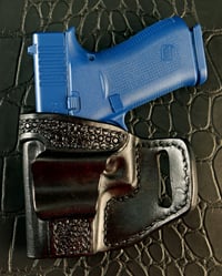 Image 3 of Glock 43x Blacked out pancake holster with hand tooling.
